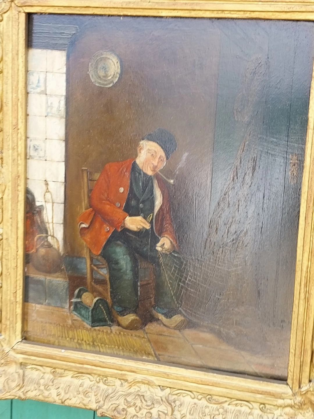 19TH CENTURY GILT FRAMED OIL PAINTING OF INTERIOR WITH DUTCHMAN