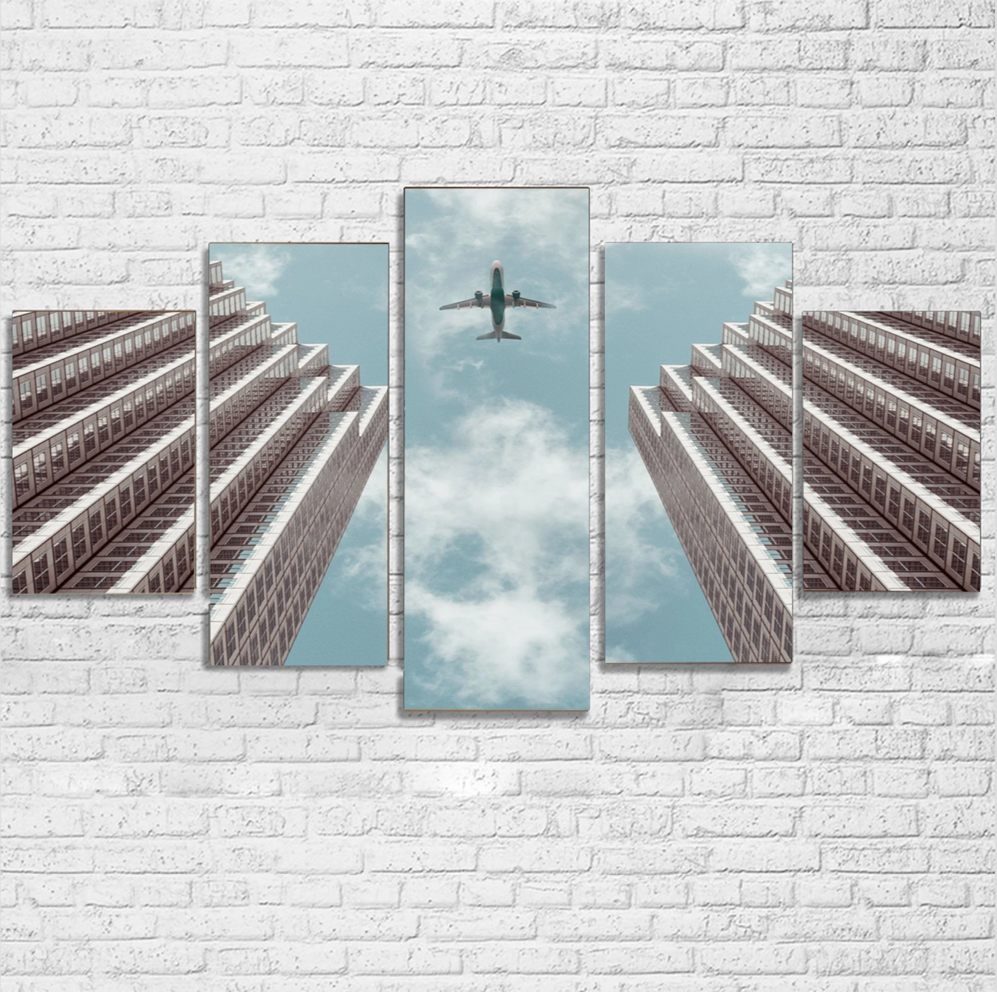 Airplane Flying over Big Buildings Printed Multiple Canvas Poster canvas mural art