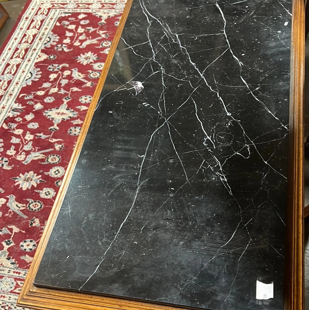 BLACK MARBLE TOP FACE CARVED WALNUT TRESTLE COFFEE TABLE