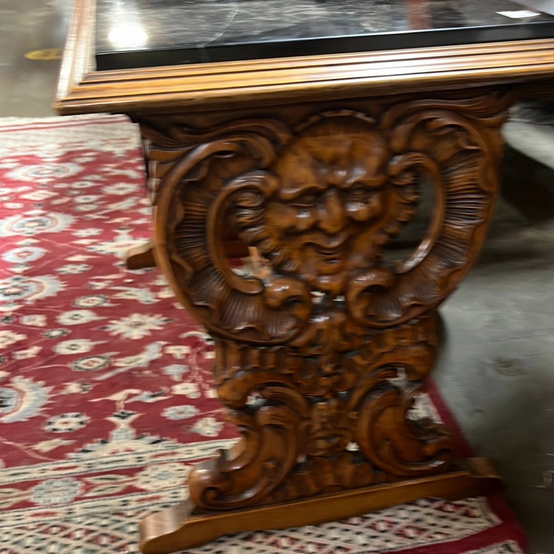 BLACK MARBLE TOP FACE CARVED WALNUT TRESTLE COFFEE TABLE