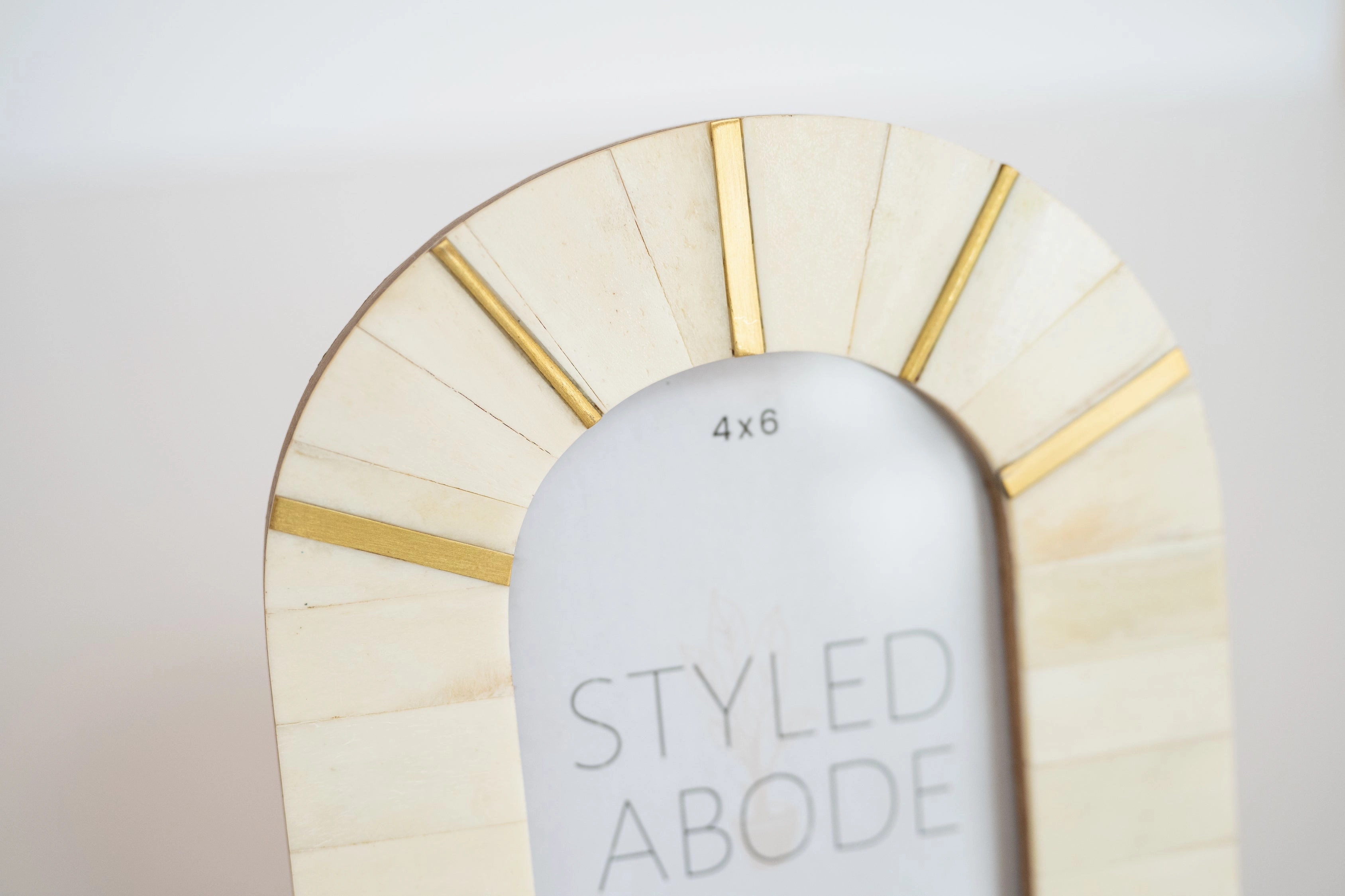 Cream & Brass Arched Frame