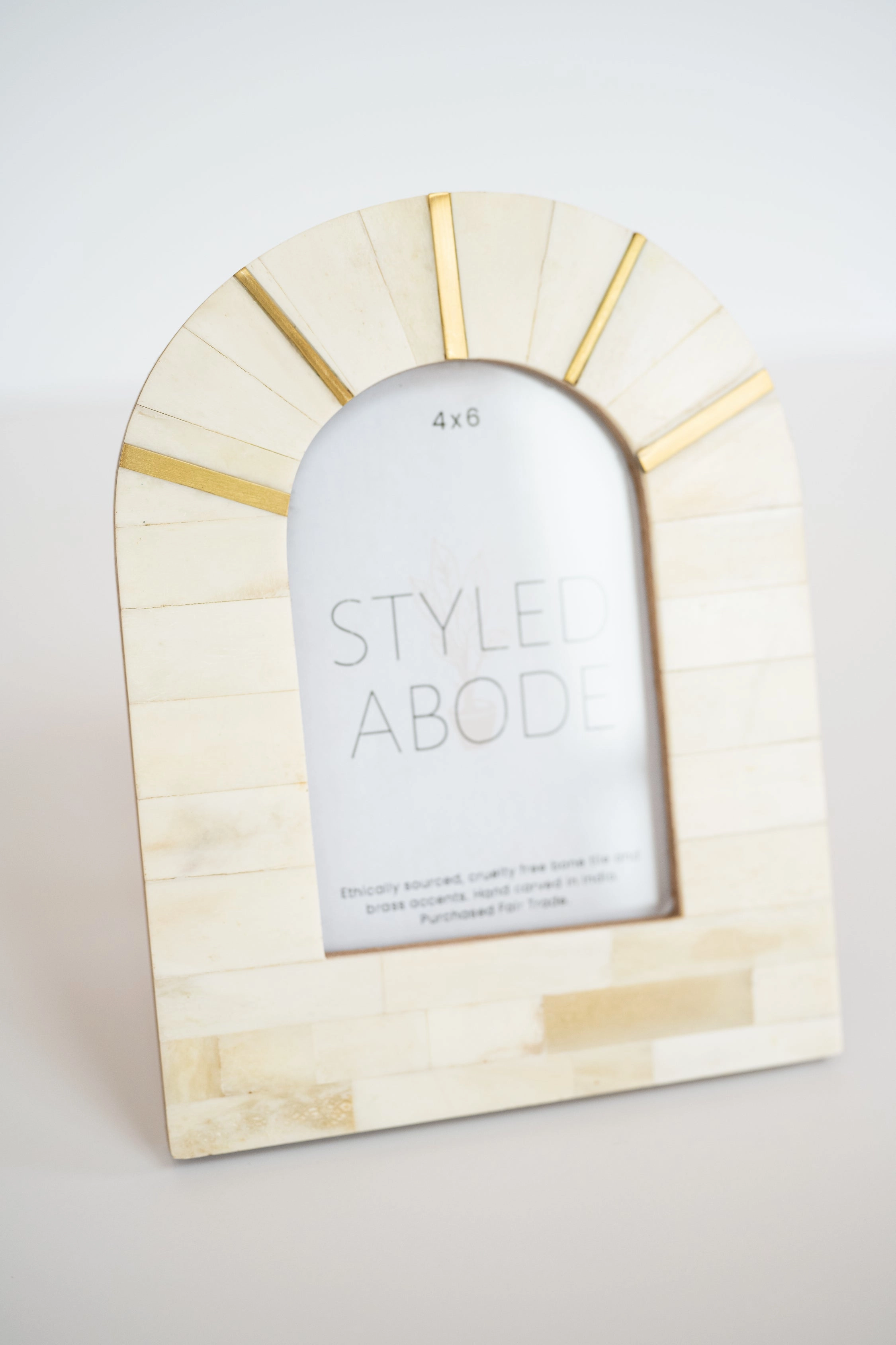 Cream & Brass Arched Frame