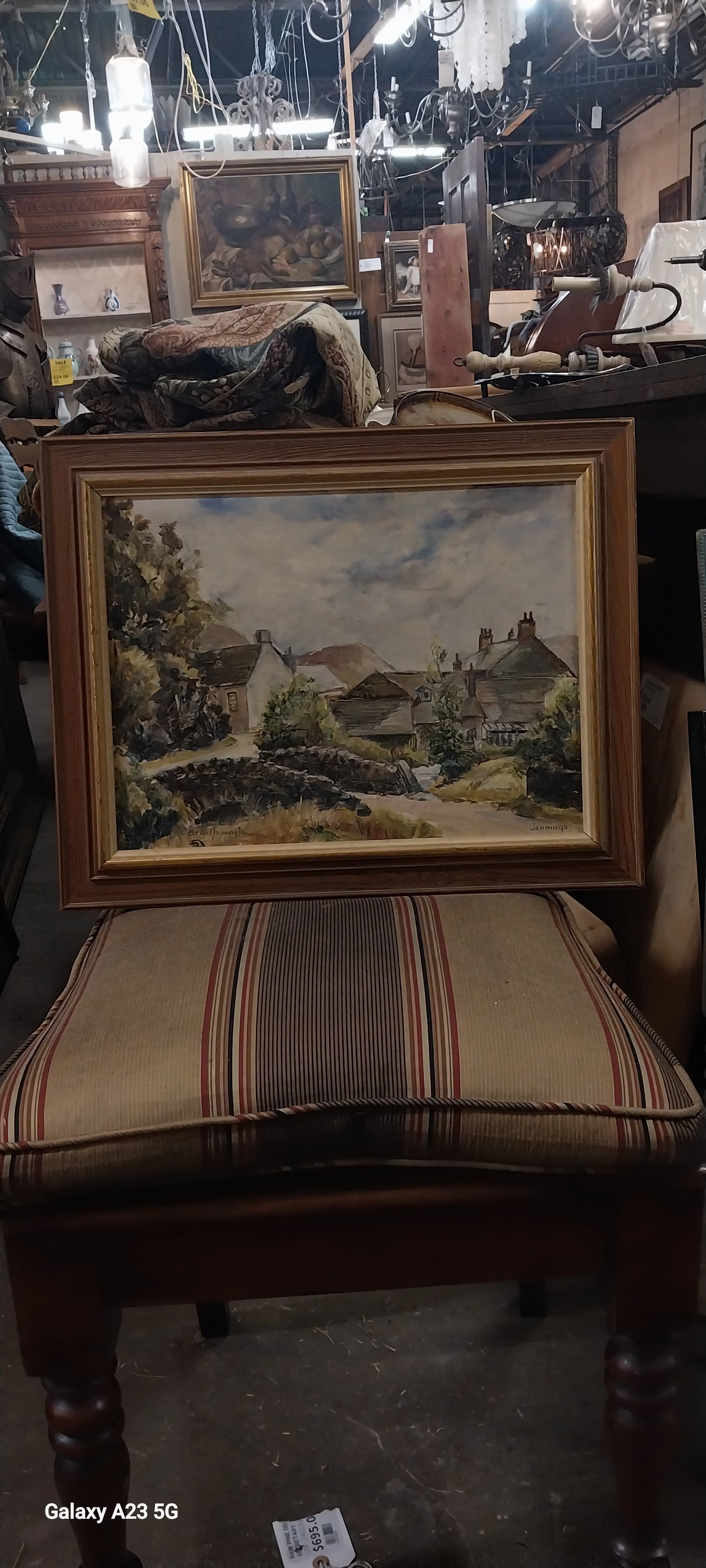 FRAMED OIL PAINTING OF A TOWN IN GREY TONES