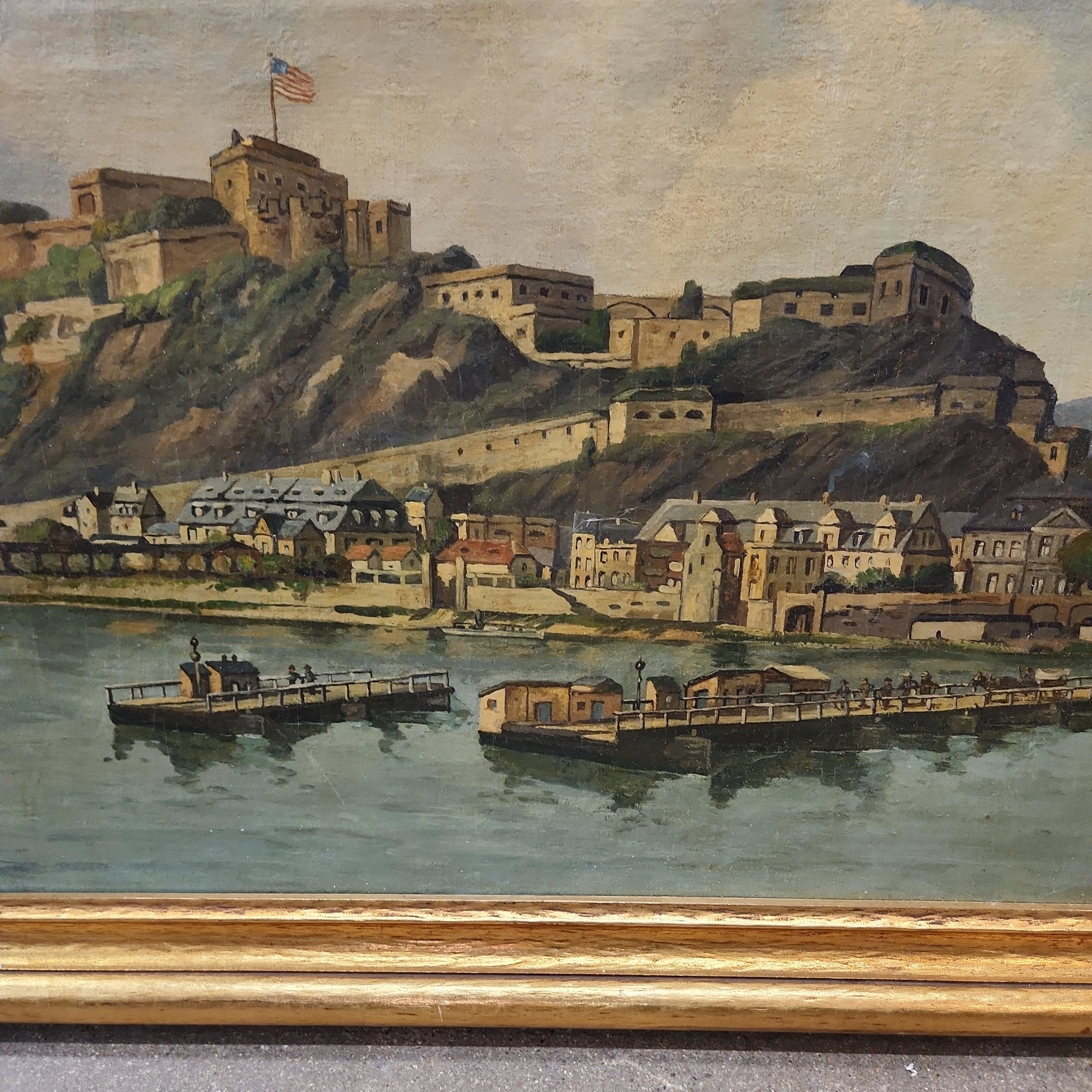 FRAMED OIL PAINTING OF A US MILITARY BASE ON THE WATER