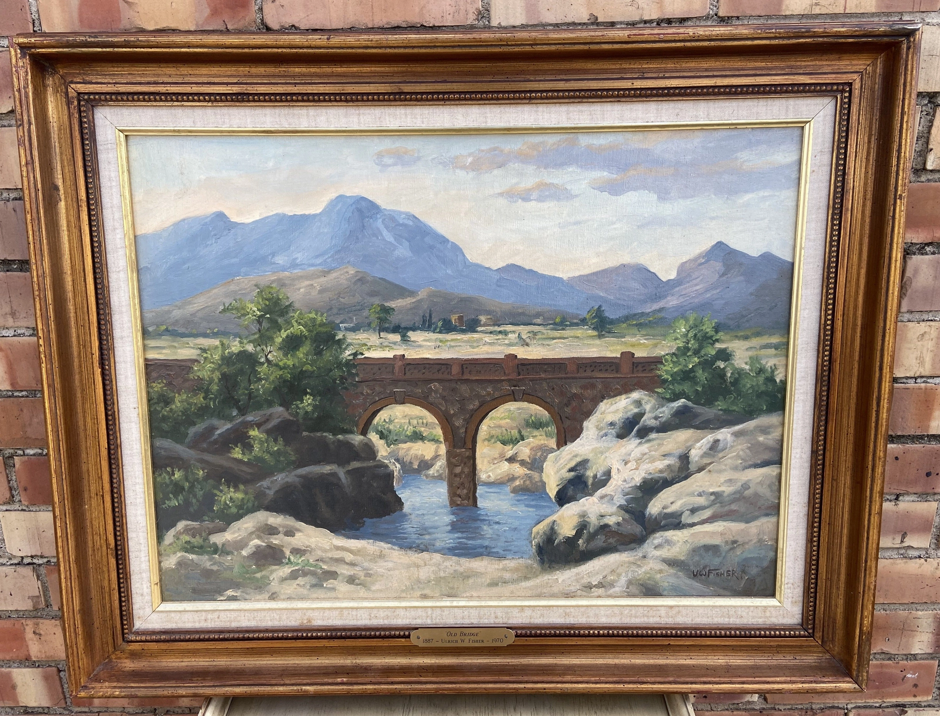 LANDSCAPE OIL PAINTING OF BRIDGE AND MOUNTAINS "OLD BRIDGE" BY ULRICH FISHER 1887-1970 classic mural painting