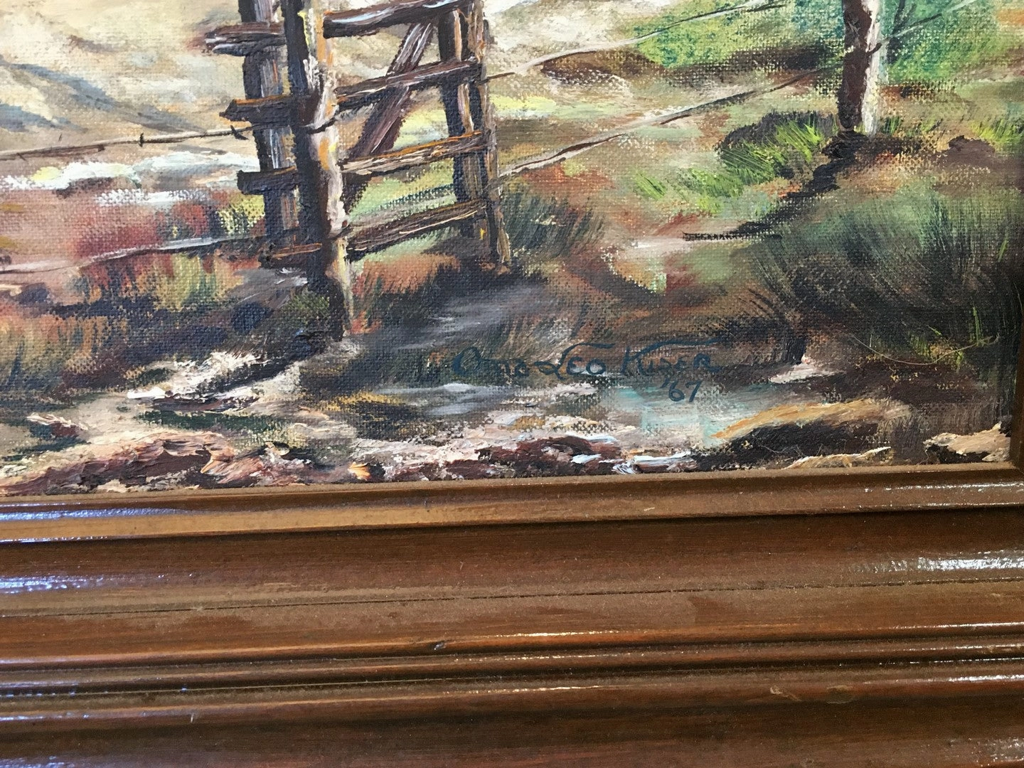 LANDSCAPE PAINTING OF A WINDMILL BY A WATERING HOLE BY LEO KISER