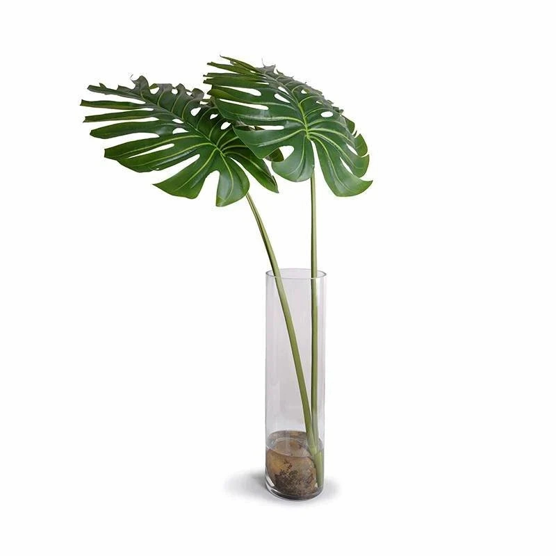 Large Faux Monstera Branches in Tall Glass Cylinder