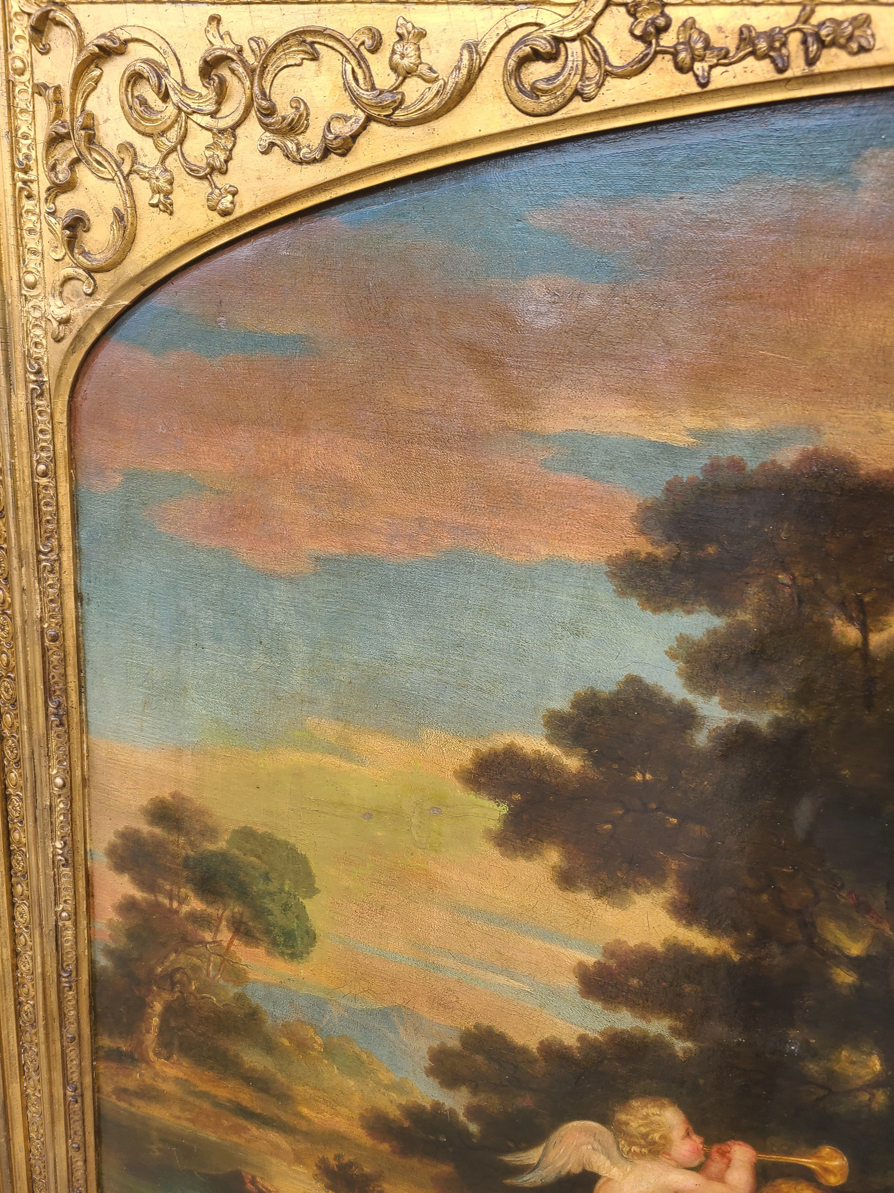 LARGE GILT FRAMED OIL PAINTING OF LOVERS WITH CHERUBS