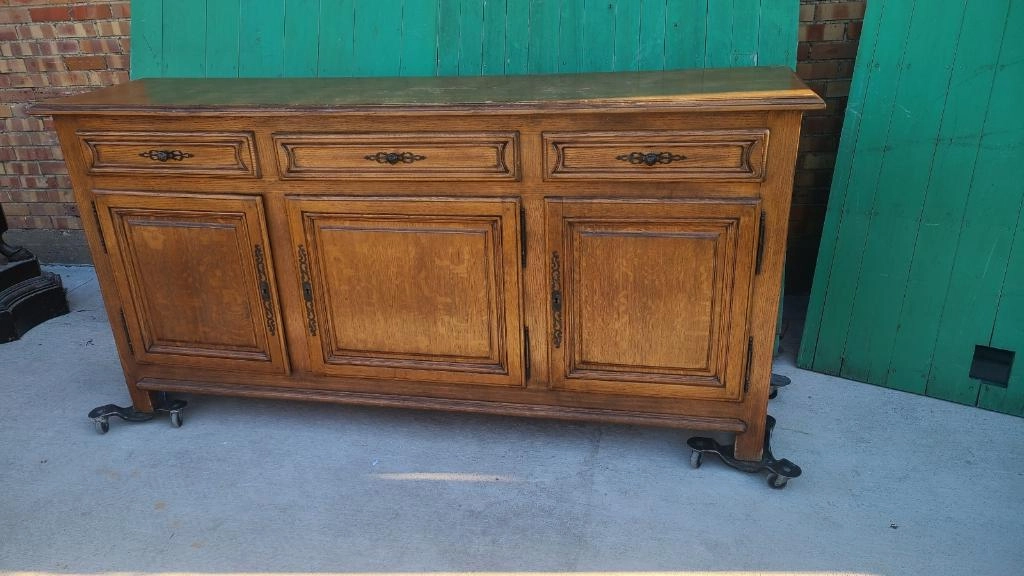 LIGHT OAK RUSTIC SHALLOW SIDEBOARD WITH FANCY STEEL PIERCED ESCUTCHEONS AND KNOBS