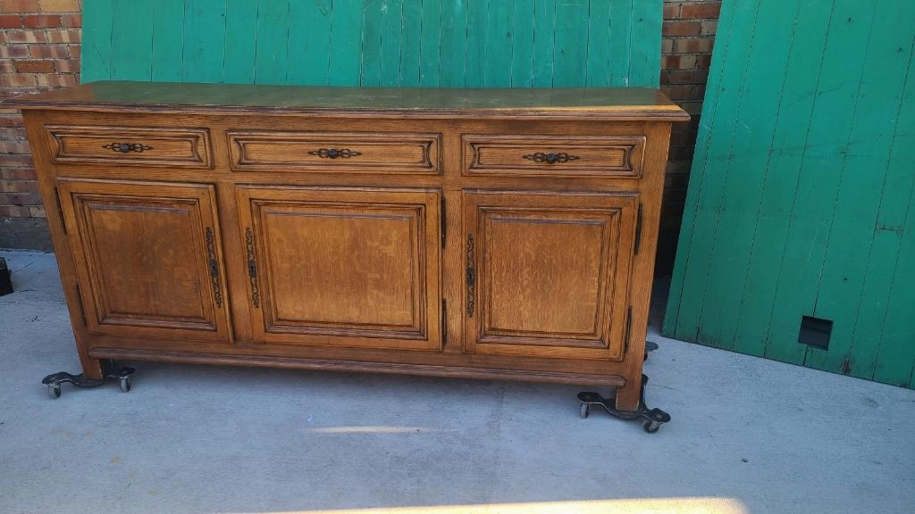LIGHT OAK RUSTIC SHALLOW SIDEBOARD WITH FANCY STEEL PIERCED ESCUTCHEONS AND KNOBS