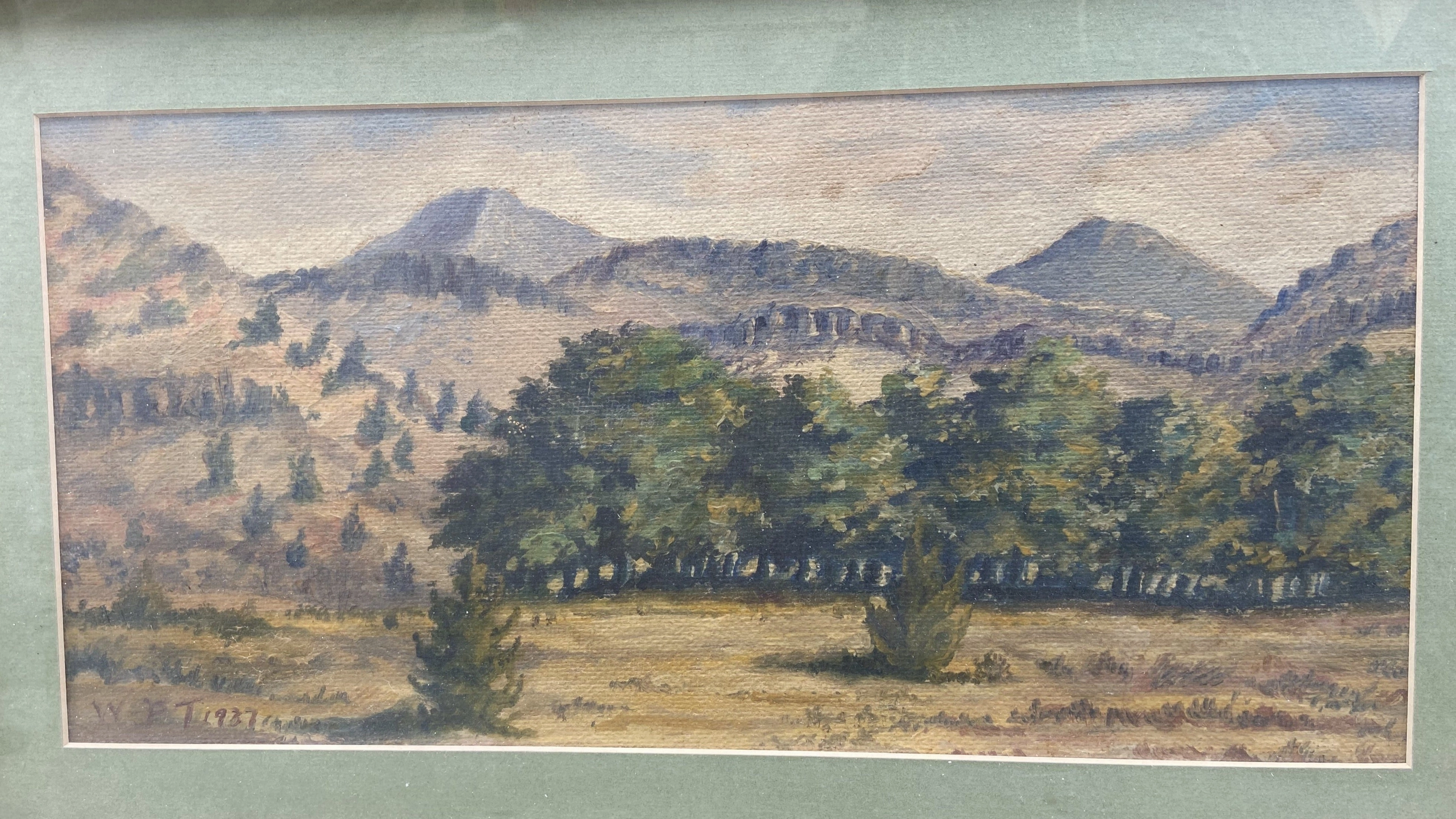 OIL PAINTING OF HILL COUNTRY WITH MOUNTAINS SIGNED 1937