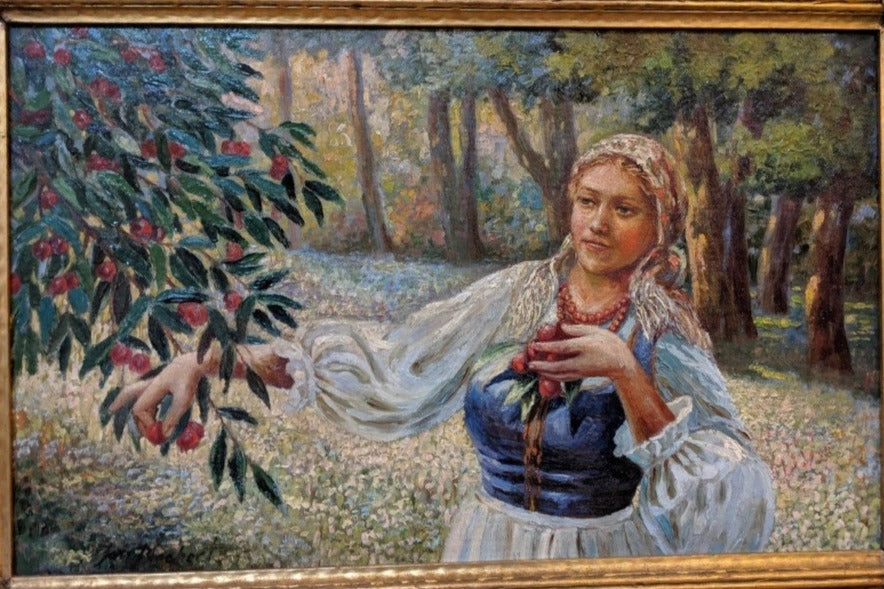 OIL PAINTING OF MAIDEN PICKING FRUIT IN ORNATE FRAME