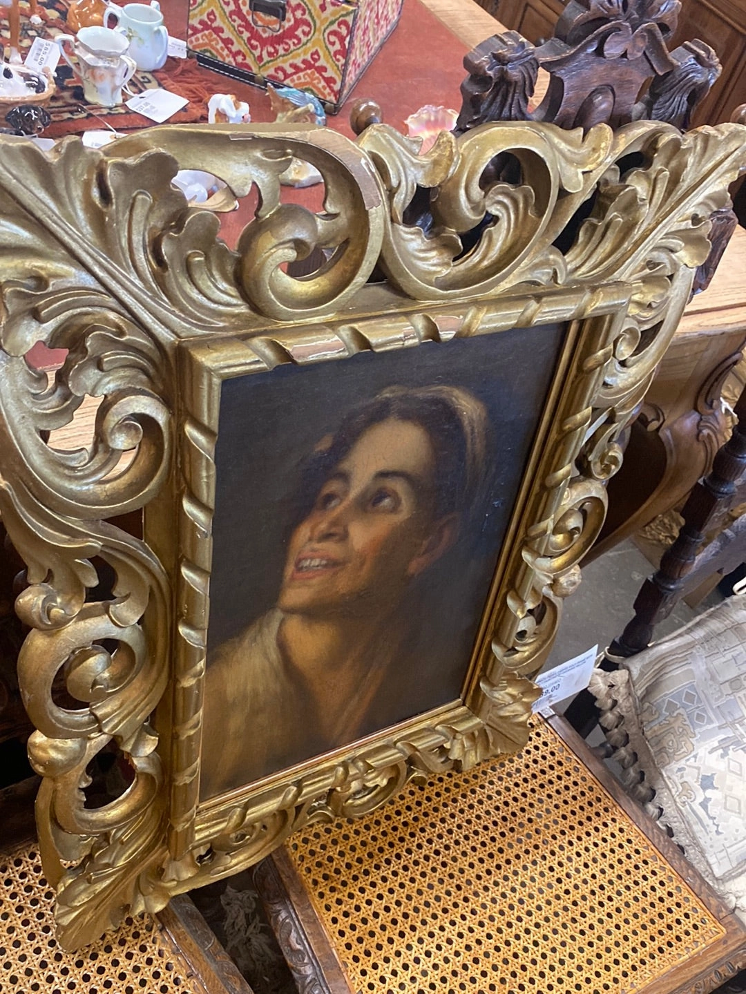 ORNATE PIERCE CARVED GOLD FRAME WITH EARLY PAINTING PORTRAIT AFTER MURILLO