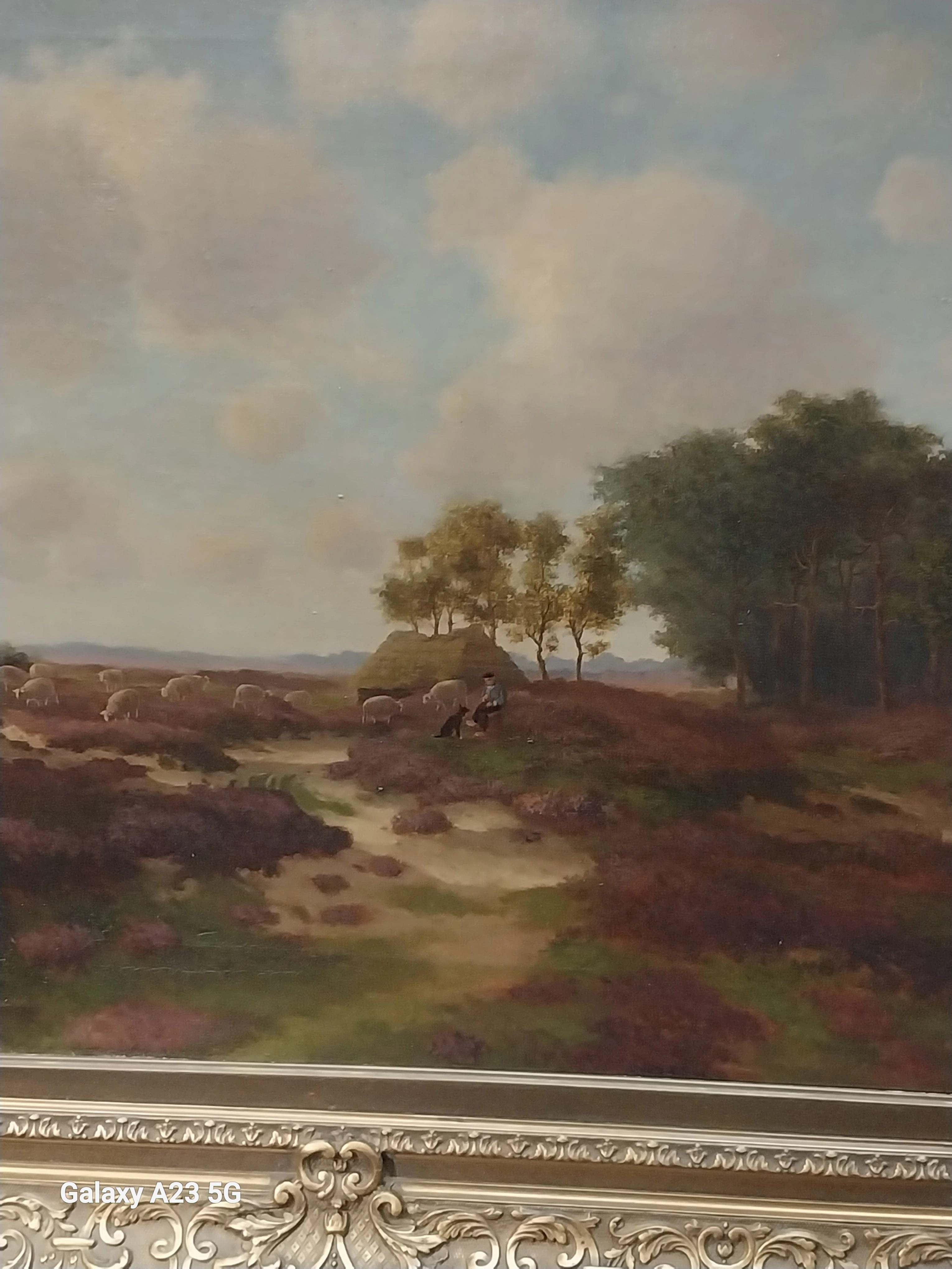 ORNATELY FRAMED LANDSCAPE OIL PAINTING WITH SHEEP