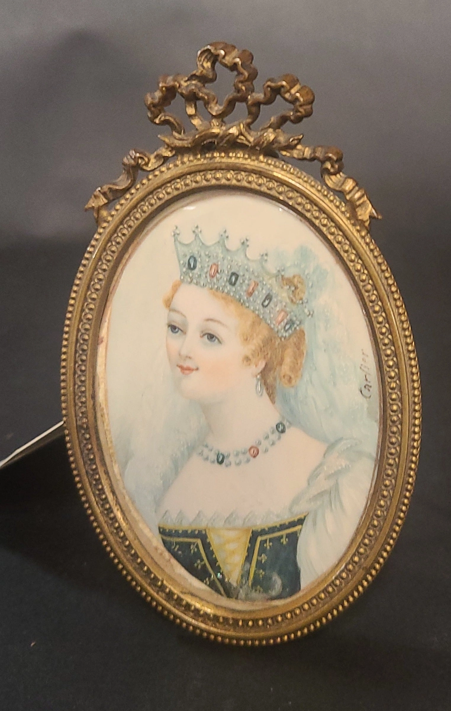 SIGNED SMALL OVAL FRAMED PORTRAIT PAINTING WITH BRASS FRAME
