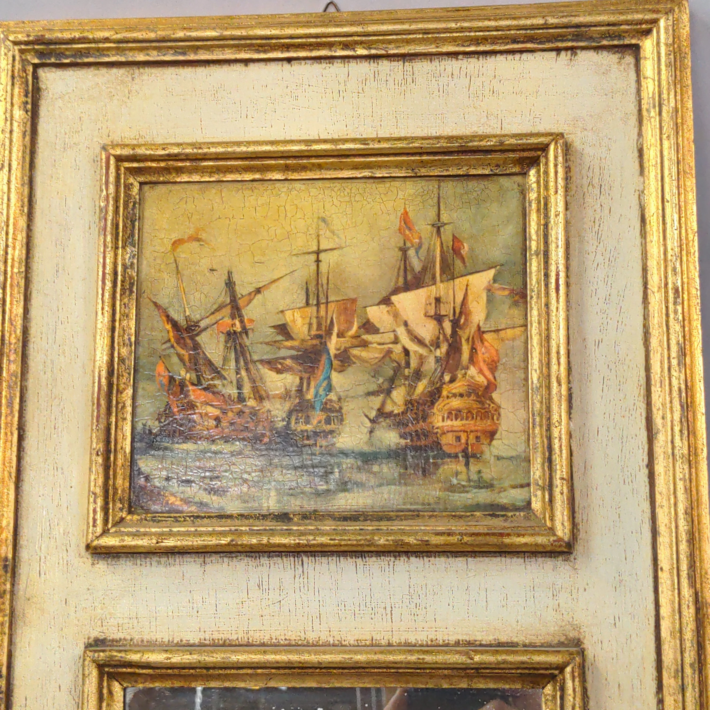 SMALL FLORENTINE GILT MIRROR WITH HARBOR PAINTING