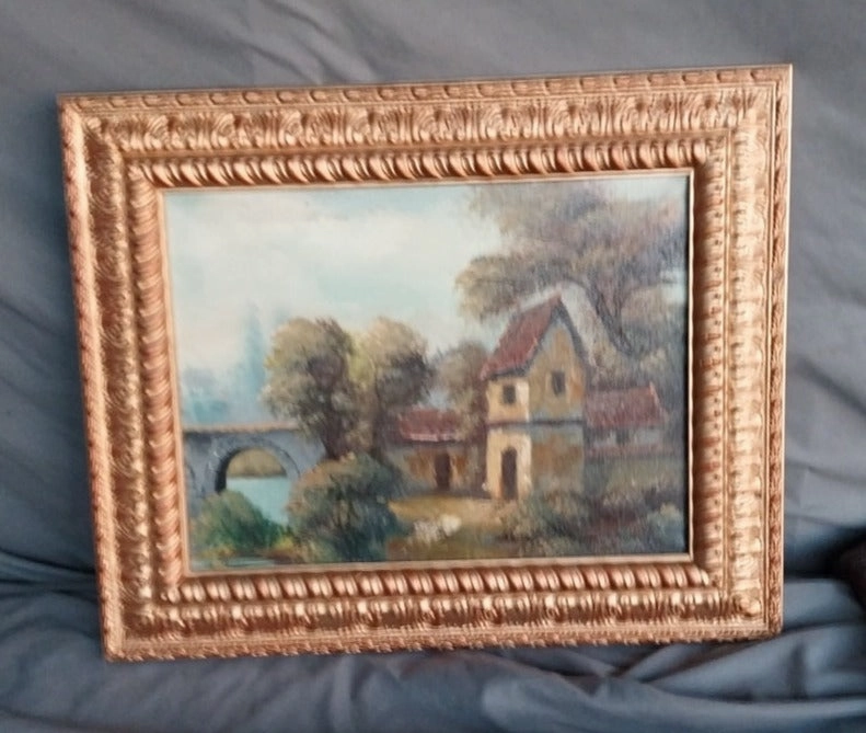 SMALL ORNATE FRAMED COTTAGE OIL PAINTING WITH BRIDGE