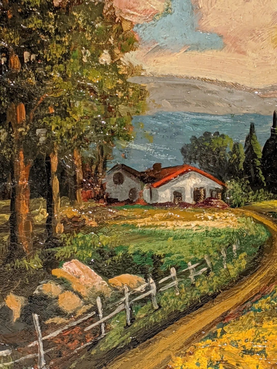 SMALL ORNATELY FRAMED OIL PAINTING OF RED ROOF HOUSE WITH FENCE AND TREES