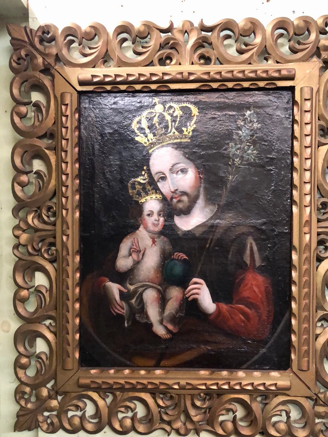 SPANISH COLONIAL SAINT OIL PAINTING WITH JESUS IN PIERCE CARVED FRAME