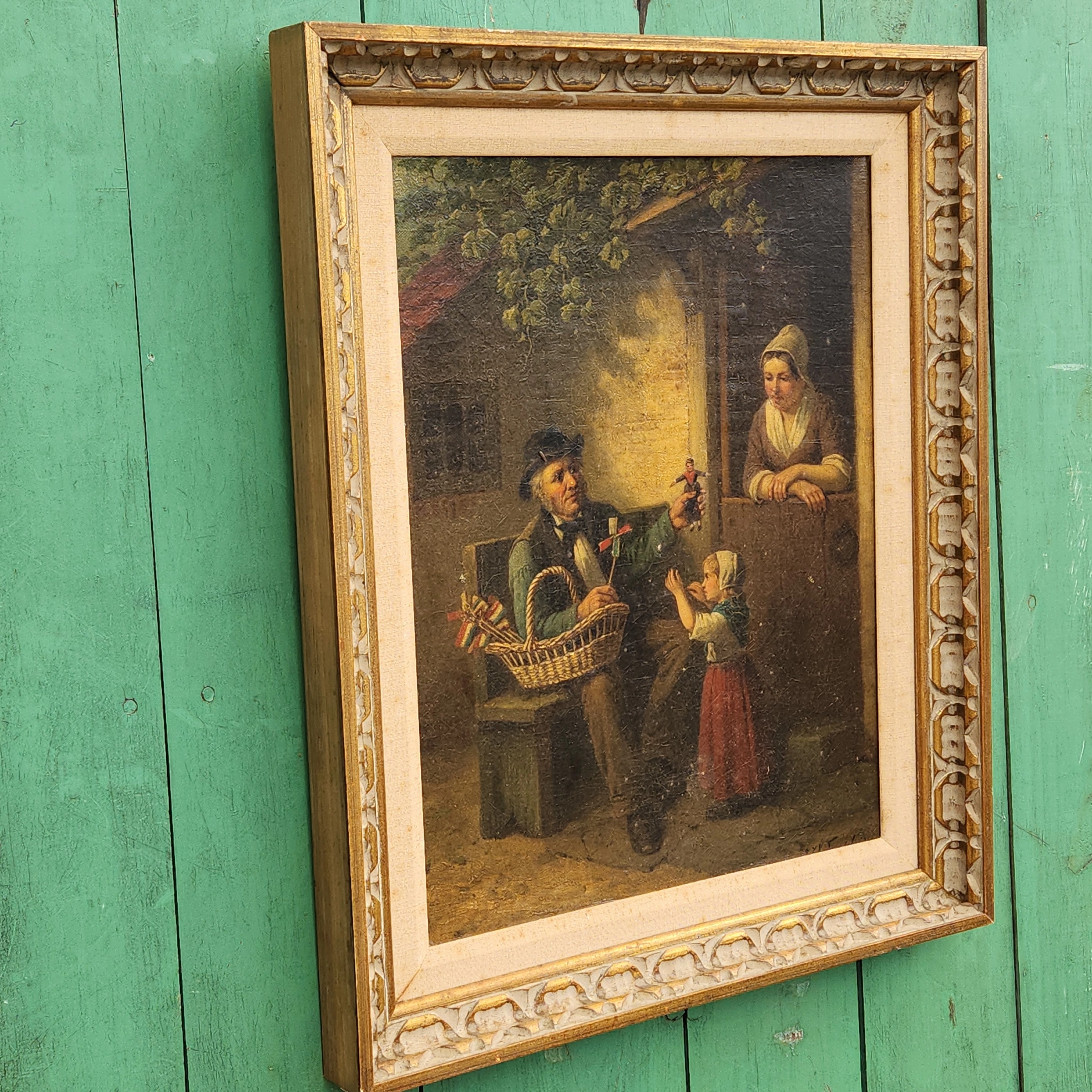TOY VENDOR WITH CHILD AND WOMAN OIL PAINTING