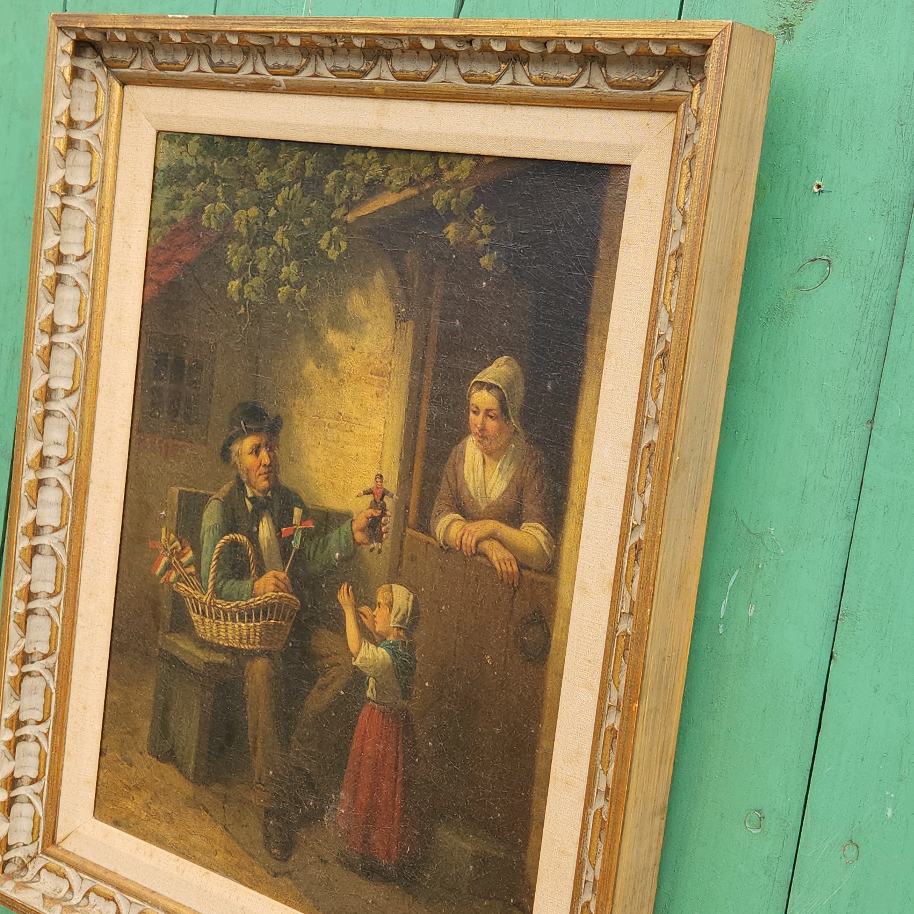 TOY VENDOR WITH CHILD AND WOMAN OIL PAINTING