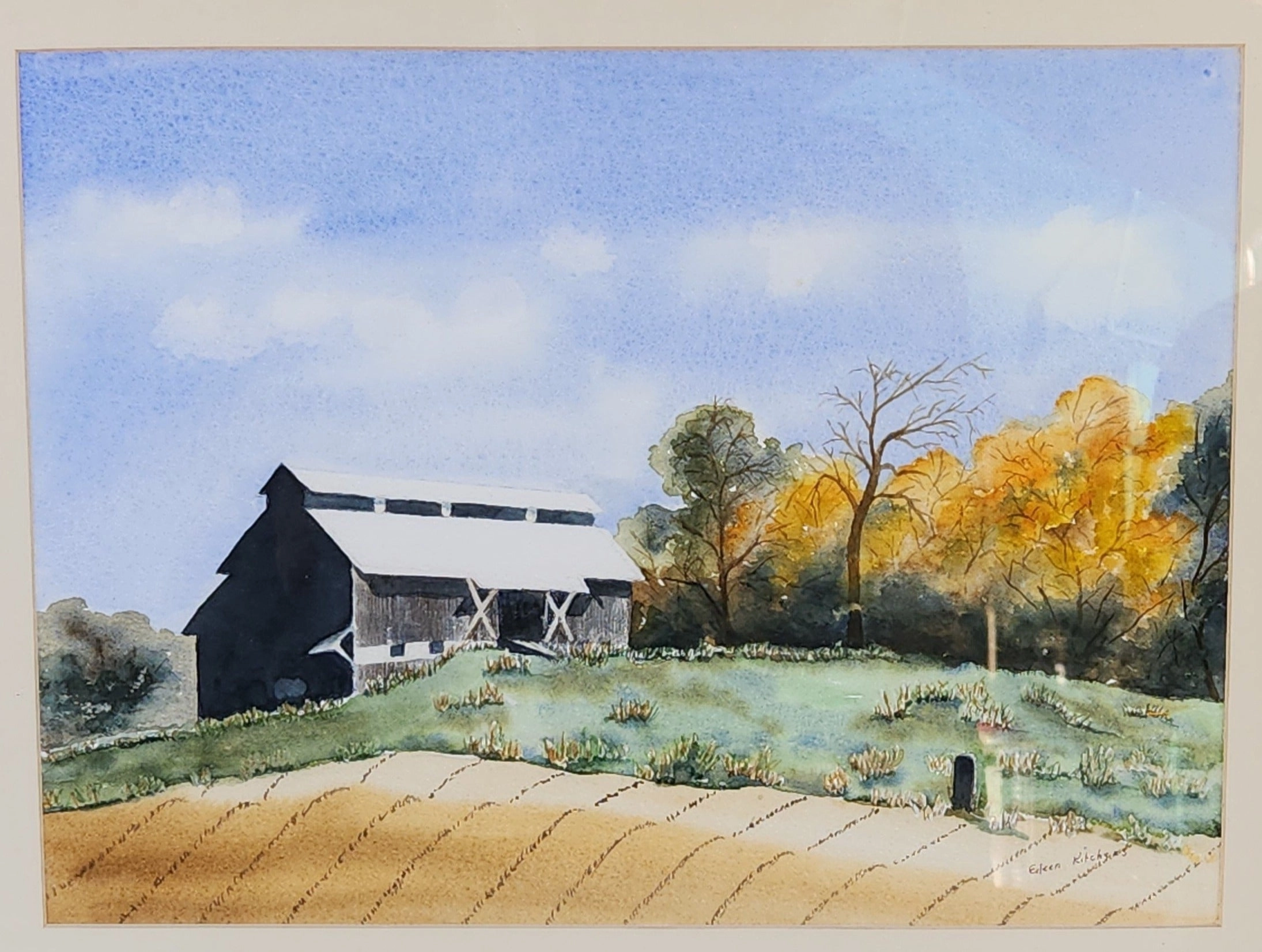WATERCOLOR PAINTNG OF A BARN WITH WHITE ROOF BY EILEEN KITCHENS